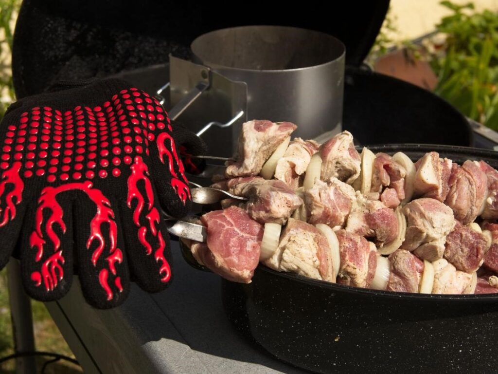 best bbq accessories for beginners with grilling tools and meat thermometer in backyard