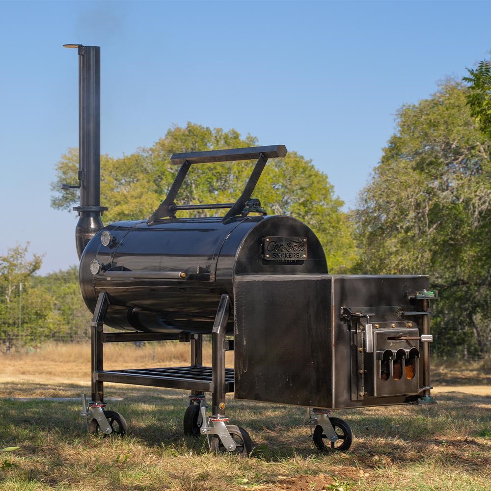 Backyard PitMaster cooking on large offset smoker with side firebox