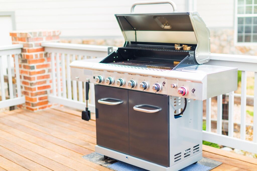 Luxury stainless steel gas grill on premium outdoor patio for BackyardPitHQ Best Stainless Steel Gas Grills 2026 guide